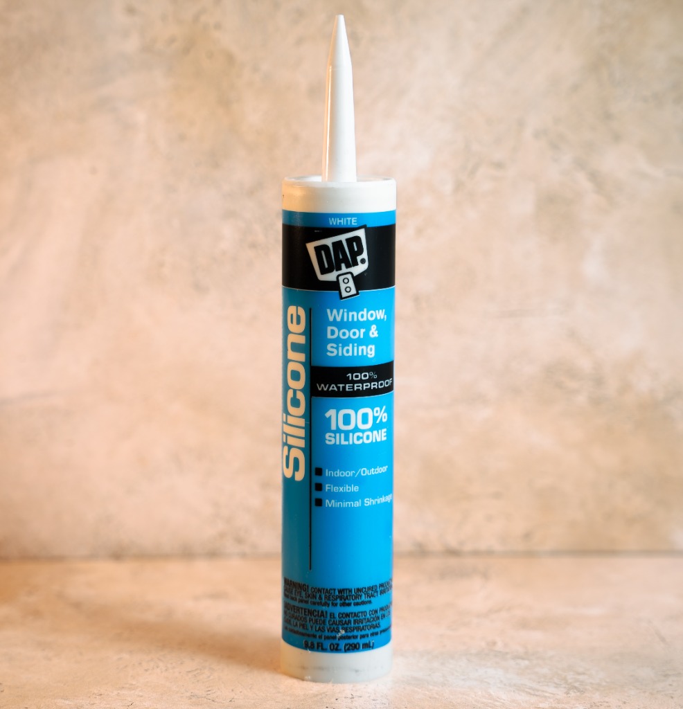 DAP Silicone window door and siding 100 percent silicone sealant white cartridge 9.8 fl oz